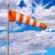Overcast and windy throughout the day and light rain starting in the afternoon.
